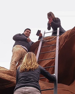 Juliana Dever climbing out of Antelope Canyon in Page, Arizona