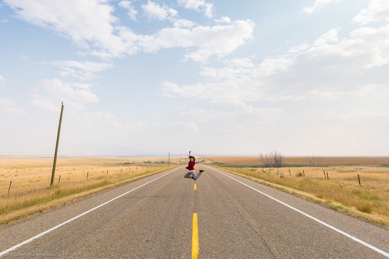 Juliana Dever jumping in Canadian Badlands